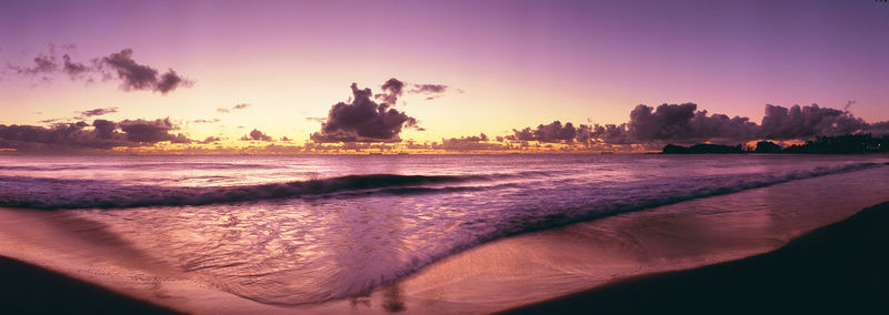 View of beach at sunset