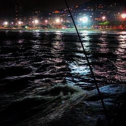 Illuminated street light at night