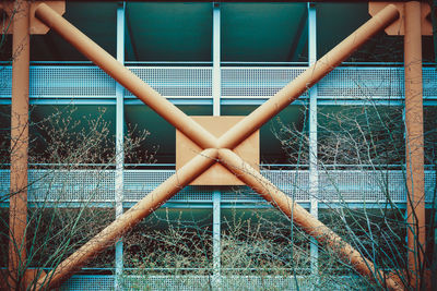 Close-up of chainlink fence against blue sky