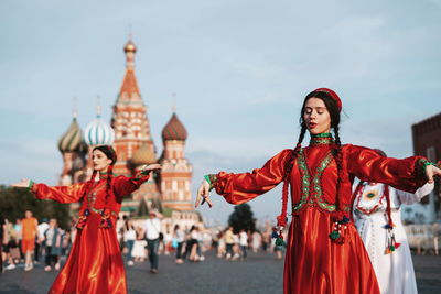 Women standing on a temple