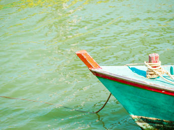 Boat moored in river