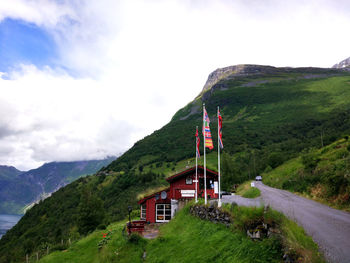 Built structure on mountain against sky