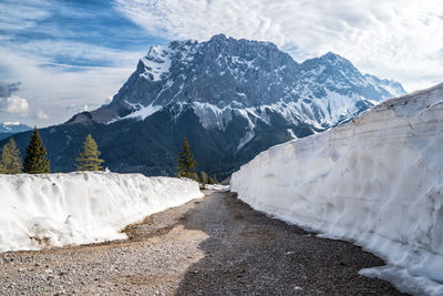 Scenic view of snowcapped mountains against sky