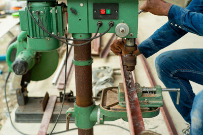 Low angle view of man working in factory