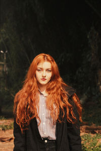 Portrait of beautiful young woman outdoors