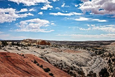 Scenic view of landscape against cloudy sky