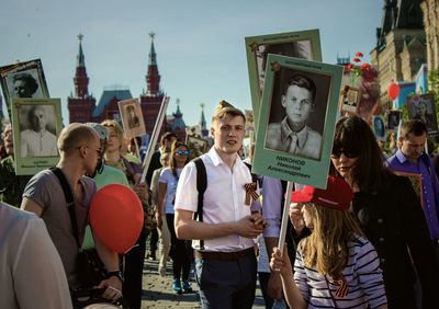 Group of people standing in front of building