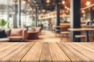 Close-up of wooden table at restaurant