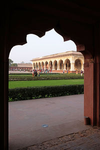 View of historic building seen through arch