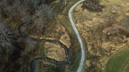 Along the farm land of wisconsin, a walking trail following a spiral river.  taken during autumn. 