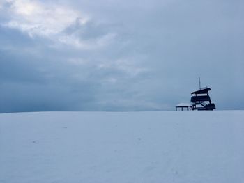 Scenic view of sea against sky during winter