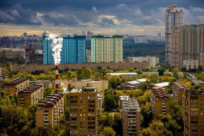 Buildings in city against sky