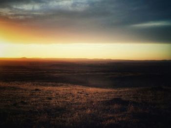 Scenic view of landscape at sunset