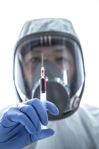 Close-up portrait of man holding camera