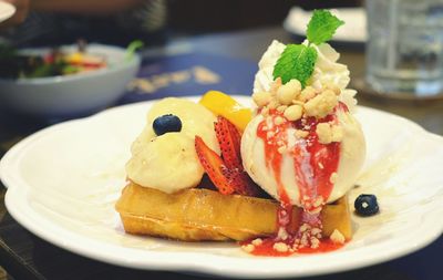 Close-up of fruits in plate