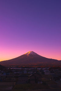 Scenic view of mountain against sky during sunset