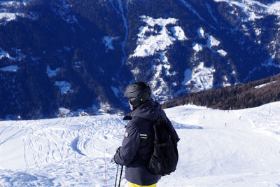 Full length of person on snowcapped mountain