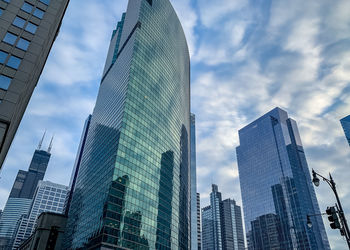 Low angle view of modern buildings against sky