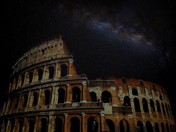 Low angle view of historical building at night