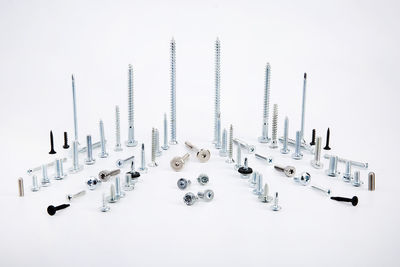 High angle view of toys on table against white background