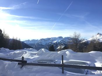 Snow covered mountains against sky