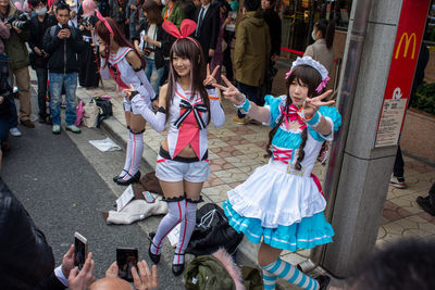 High angle view of people photographing on street