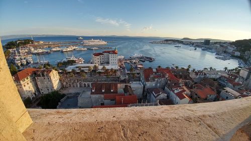 High angle view of houses and town against sky