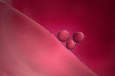 High angle view of pink balloons on table