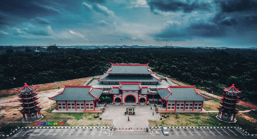 Building against cloudy sky