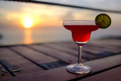 Close-up of wineglass on table