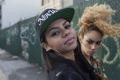 Portrait of two stylish young women