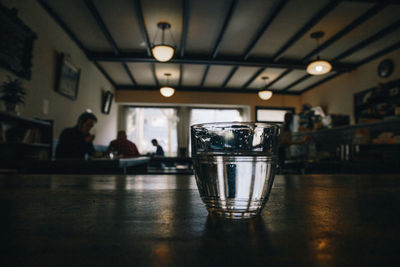 Close-up of beer glass on table