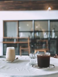 Close-up of coffee served on table in cafe