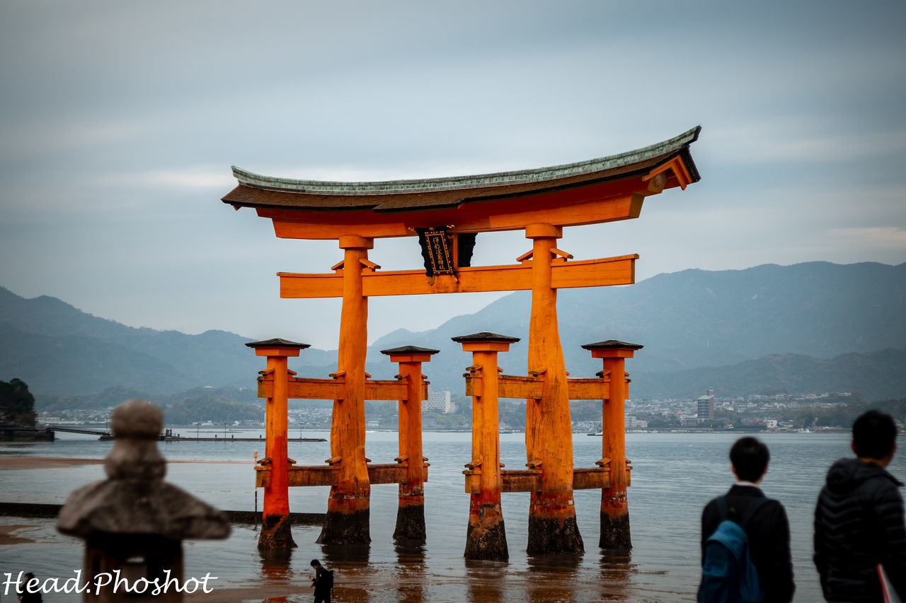 VIEW OF TEMPLE AGAINST MOUNTAIN