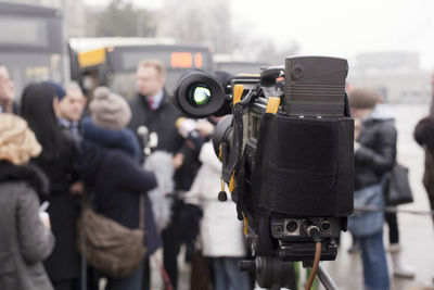 Close-up of people photographing