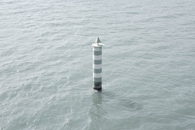 High angle view of lighthouse on sea