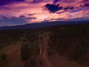 Scenic view of landscape against sky during sunset