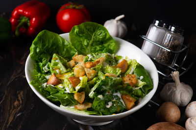 High angle view of salad in bowl on table