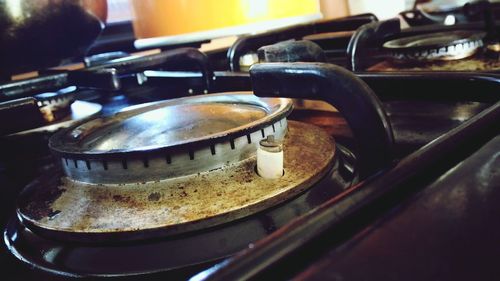 Close-up of old stove in kitchen