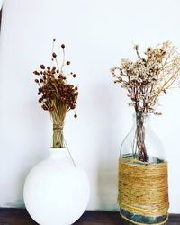 Close-up of white flower vase on table