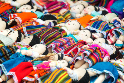 Row of dolls for sale