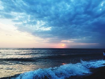 Scenic view of sea against sky during sunset