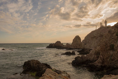 Scenic view of sea against sky during sunset