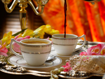Close-up of coffee served on table