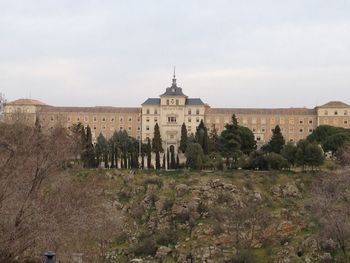 Castle against sky in city