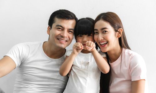 Portrait of a smiling young couple