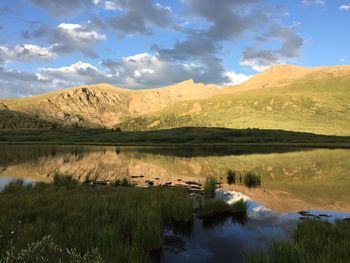 Lake with mountains in background