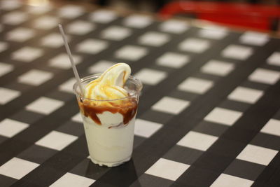 Close-up of ice-cream on table