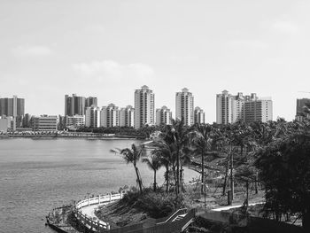 Scenic view of buildings in city against sky