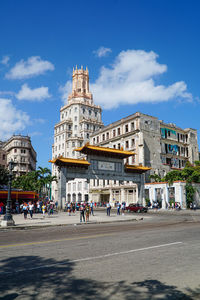 Buildings in city against sky